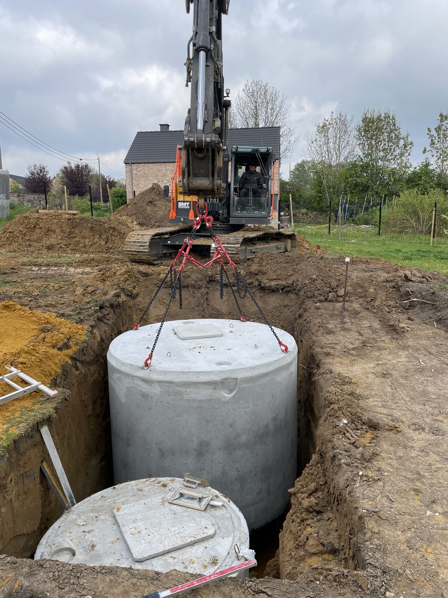 pose d'une citerne à eau de pluie 